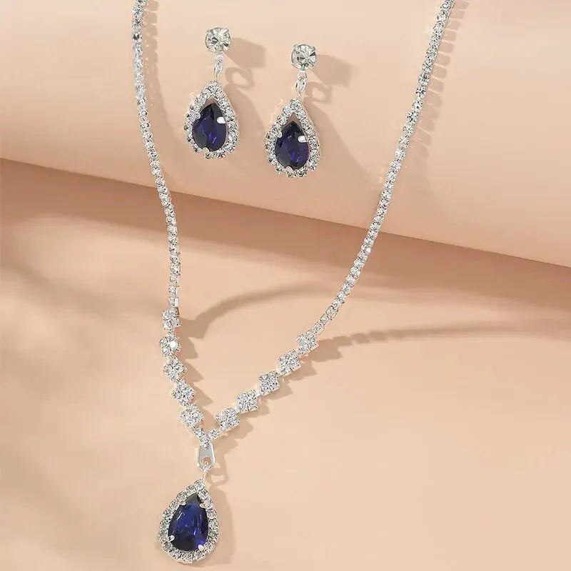 Karnz | Schimmernde blaue Tropfen-Diamant-Halskette und Ohrringe Set