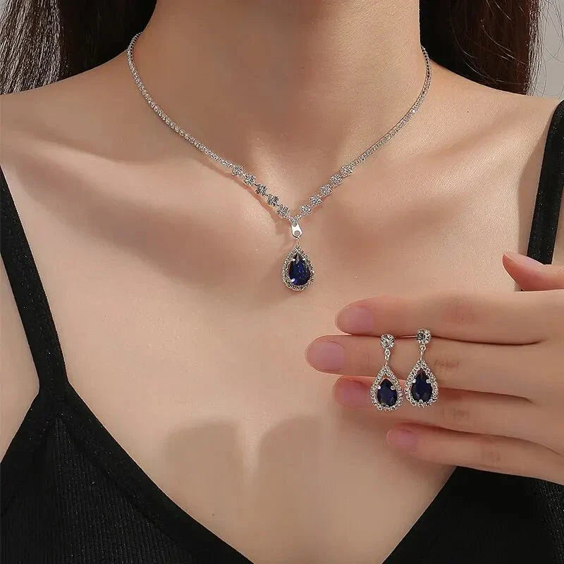 Karnz | Schimmernde blaue Tropfen-Diamant-Halskette und Ohrringe Set