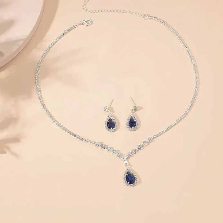 Karnz | Schimmernde blaue Tropfen-Diamant-Halskette und Ohrringe Set