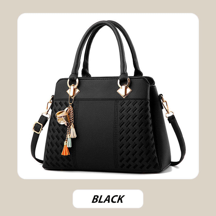 Elegante Damenhandtasche mit Quastenanhänger