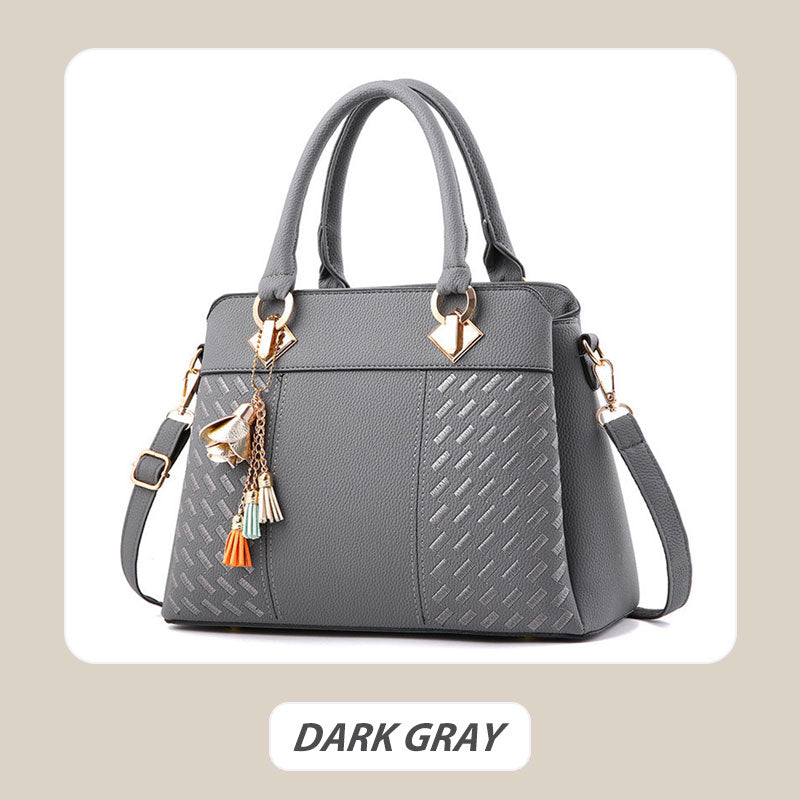 Elegante Damenhandtasche mit Quastenanhänger